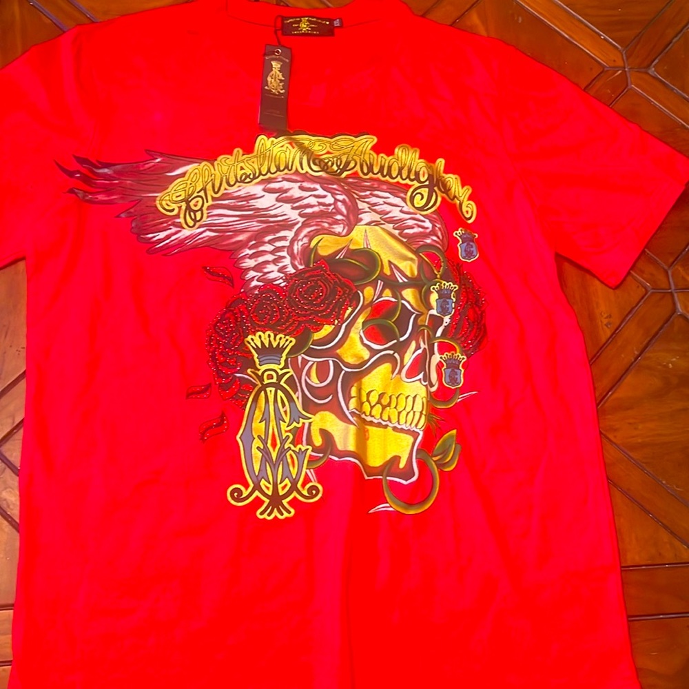New with tags Christian Audigier t shirt XXL fits like a Large.